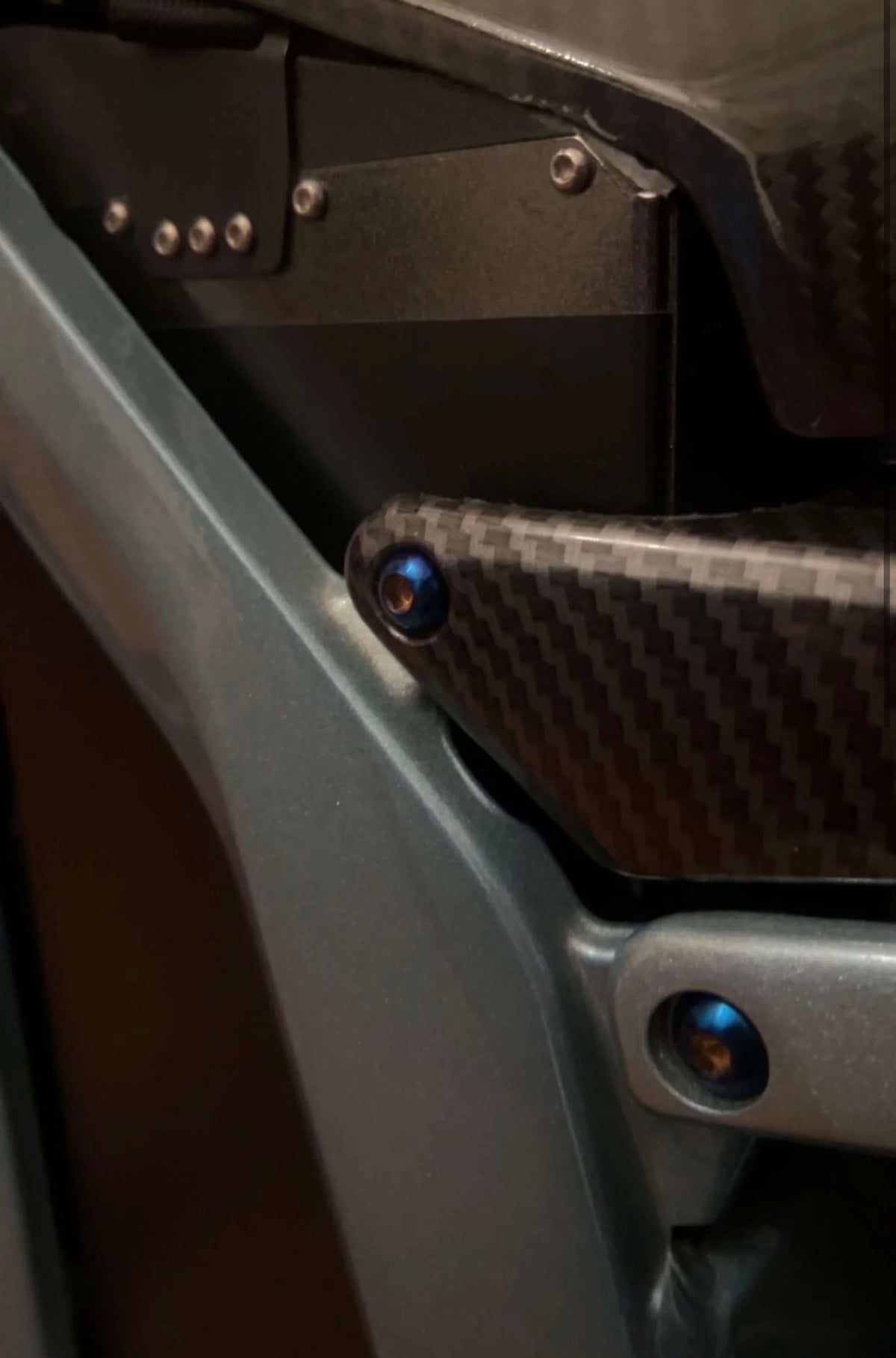 Battery lid lock titanium bolts